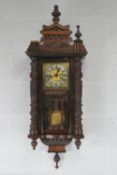 An early 20thC Vienna wall clock having