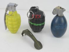 An inert L56A1 practice grenade. Togethe