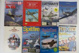 A quantity of assorted military themed b