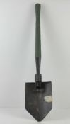 A WWII US entrenching tool dated 1944.