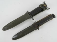 A US M16 bayonet with scabbard. Together