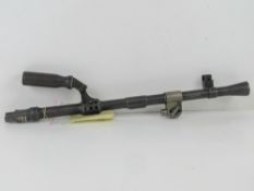 A deactivated Bren MKIII Barrel with car