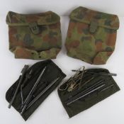 Two US army cleaning pouches together wi