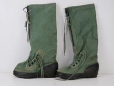 A pair of extreme cold weather boots US