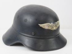 A WWII German helmet, stamped RL2-39/21,