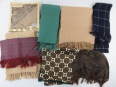 A 100% wool scarf together with two lamb