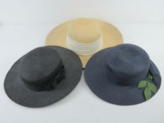Three 100% straw hats in navy, black and