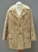 A vintage fur coat, no apparent labels,