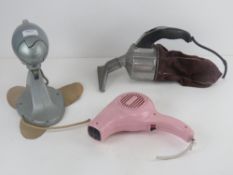 A vintage Pifco plastic hair dryer, a Vactric hand held vacuum cleaner and a GEC 12'' desk fan.