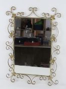A contemporary square-shaped mirror in gold coloured floral frame, frame 61.5 x 43.5cm.