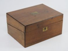 A Victorian mahogany writing box, lid lifting to reveal fitted compartment within, a/f, engraved