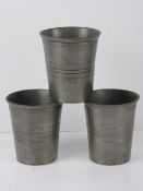 Three German pewter cups having Stuttgart labels and featuring engraved crest upon, each 11.5cm
