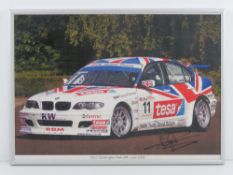 A framed photographic print from the ETCC Donington Park Race Meeting 29th June 2003 signed by