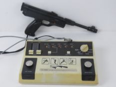 A rare Sonix BTVG-JM888 dedicated console c1970s pong variant with 'rifle' handset, 'video game -