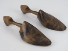 A pair of vintage wooden shoe lasts, size 7 1/2.
