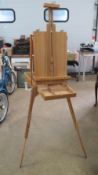 A well made artists box with integral easel.