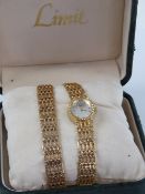 A ladies Limit wristwatch with matching bracelet, in box (slightly a/f box) with paperwork.