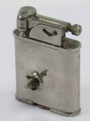 A WWII UL lighter with bullet stuck in it, made in England.