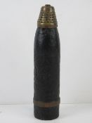 An inert WWI French 75mm Anti-Aircraft Round with unfired drive band.