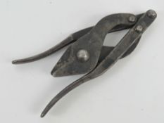 A pair of WWII British wire cutters, British marked with serial number 082/55 on the handle.