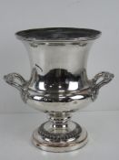A fine quality silver plated champagne cooler or ice bucket, some wear commensurate with age,