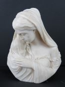 A well carved 19thC bust of a pensive female. 32cm high.