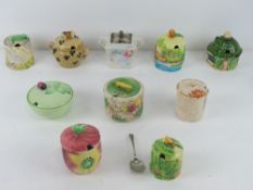 A quantity of ceramic conserve pots in various styles inc Carlton ware, Lancaster's, Shorter & Son,