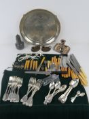 A quantity of silver plated flatware together with a large silver plated serving tray,
