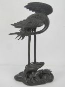 A 20th century bronzed cast brass Oriental stork upon naturalistic base with single terrapin, a/f,