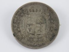 An 1887 Victoria half crown coin mounted for use as a brooch, 3.2mm dia, 14.9g.