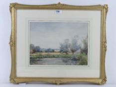 Watercolour; view over reeded lake, trees and sky beyond etc, unsigned in good gilt frame 25 x 34cm.