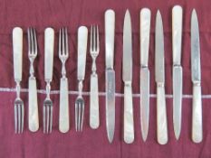 A fine set of HM silver and mother of pearl handled cake knives and forks for six settings,
