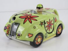 A Lorna Bailey teapot in the form of a racing car, 'Love 1' pattern,