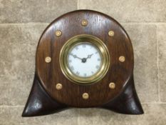 A large laminated mahogany propellor boss having centre mounted clock with Roman numerals apron.