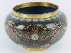 An early 20thC Chinese cloisonné Canton enamel censer bowl in black ground with opposing dragons