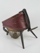 A dentists bellows foot pump marked 'Buffalo Dental MFG Co Buffalo NY' upon