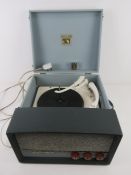 A vintage record player 'His Master's Voice' Garrard model 209 with replacement stylus.