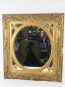 A late 18th/early 19thC gilt wood and plaster square shaped wall mirror,