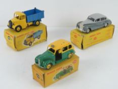 Dinky Toys; three boxed vehicles being Bedford End Tipper 410, Rolls Royce Silver Wraith 150,