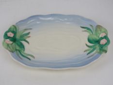 A 1930s Clarice Cliff serving plate of rippled pond design bearing green back stamp, pattern 982,