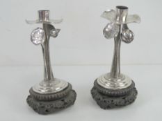 A pair of 19th century Chinese Qing Dynasty silver and wood Lotus flower candlesticks bearing marks