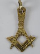 Freemasonry; A square and compasses design pendant, no apparent hallmark, 1g.