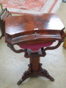 A good half veneered walnut work table having flame mahogany top,