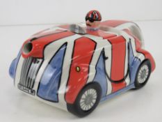 A Lorna Bailey teapot in the form of a racing car, '605 SWING 3R' pattern,