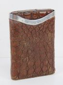 A finely made alligator skin and HM silver cigar case, hallmarked London 1902, 12.5 x 9cm.