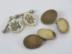 A pair of 9ct gold on silver cuff links together with a pair of Oriental white metal and mother of