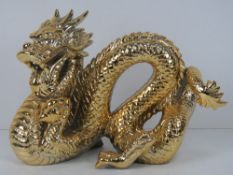A Japanese made gilded dragon as made by John Jenkins International Porcelain Crystal and Glass,