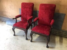 A fine pair of mahogany high back hall chairs.