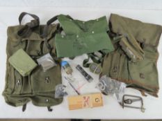 A quantity of assorted militaria items, including Minime spent round catch bag, sling,tool,