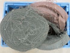 Four hessian burlap Ghillie suits in brown and green.